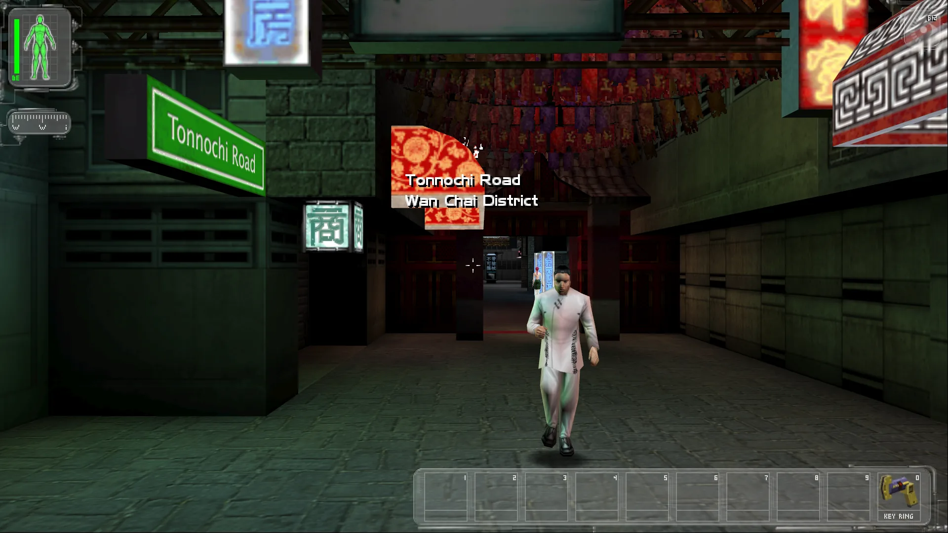 Tonnochi Road in the Wan Chai district with neon signs and a pedestrian
